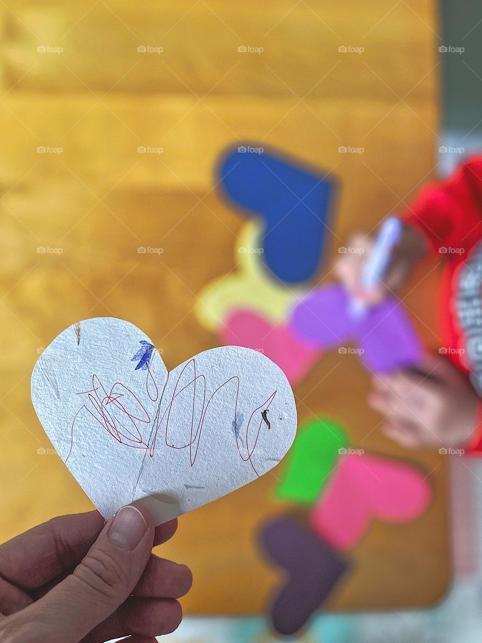 Toddler crafts with mommy, mommy and me time, indoor crafts in the winter time, colorful hearts made for family and friends, drawing on hearts, making valentines with love, homemade valentines with toddlers, fun crafts with toddlers 