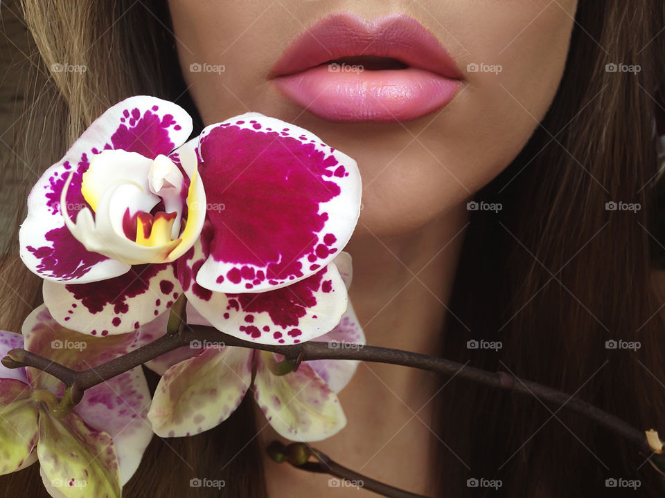 Pink lipstick and pink orchid 