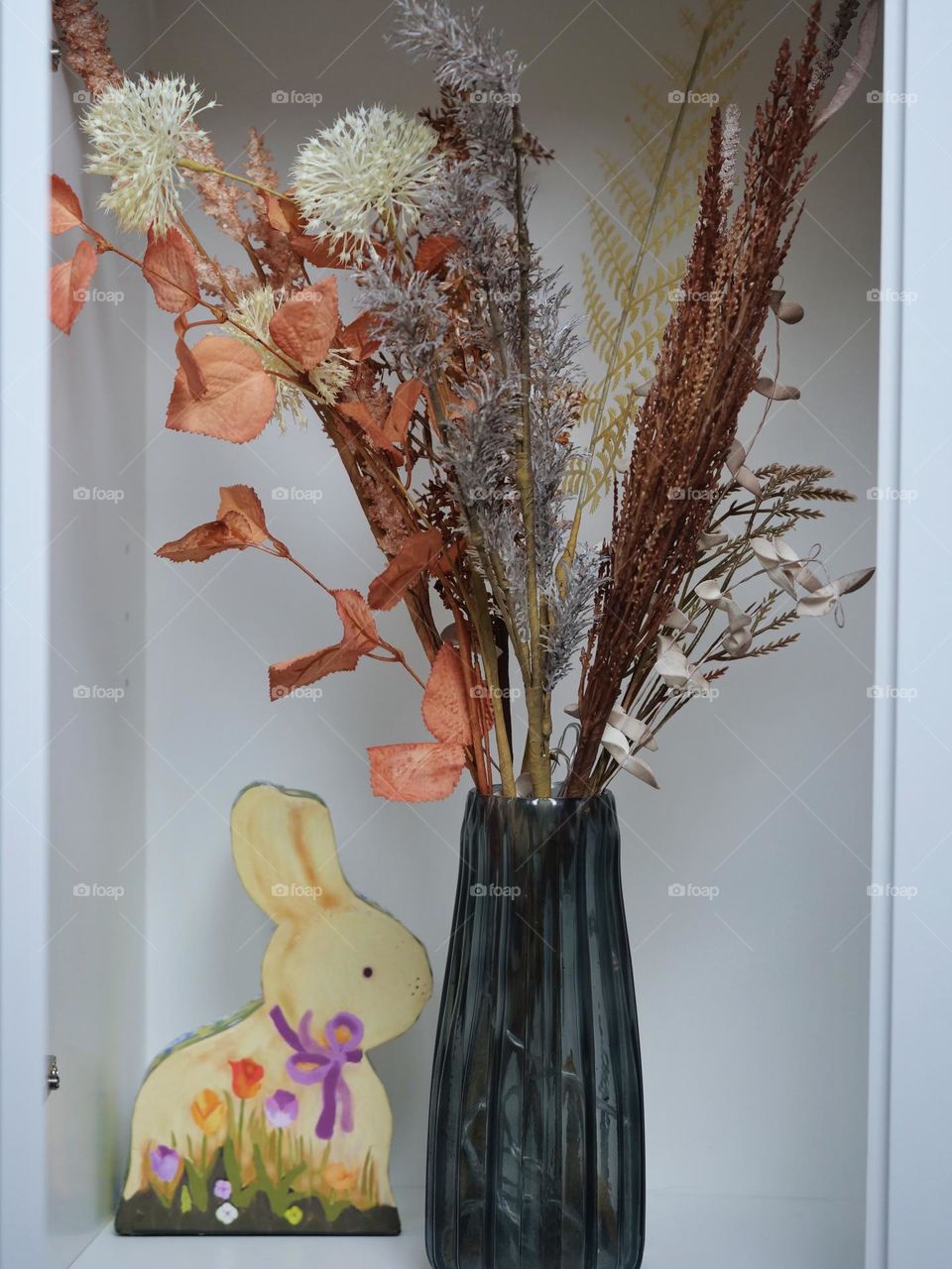 Vase with dried flowers