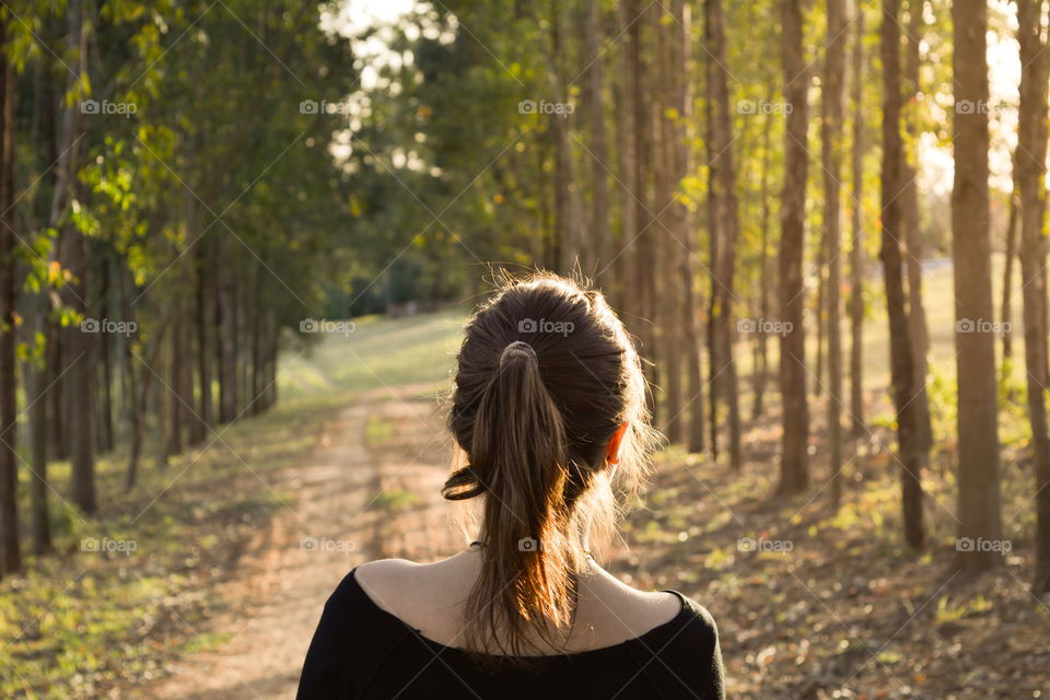 girl walking in the road