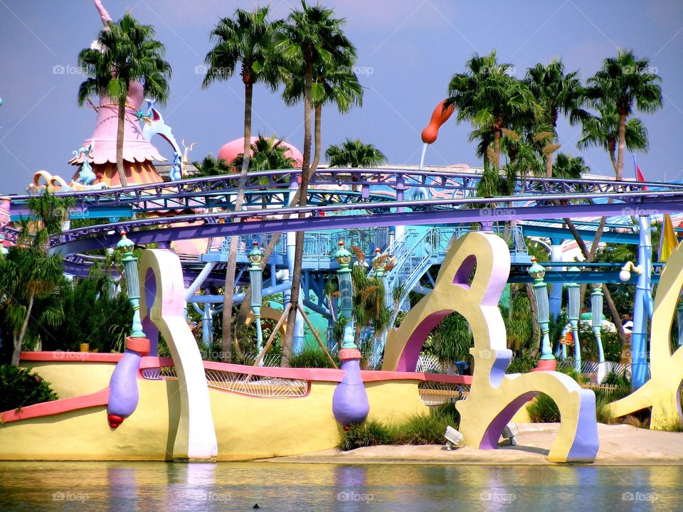 What a wonderful assortment of vibrant colors. The bright strong constant stream of sunlight makes everything pop so much more than usual. Universal Studios  Orlando, Florida is a great place to vacation. This is a peak towards something Dr. Seuss.
