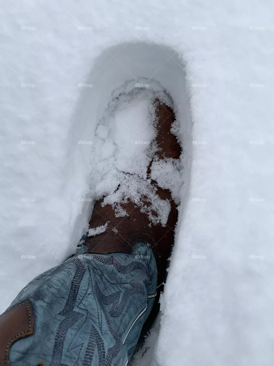 Foot print in the snow 