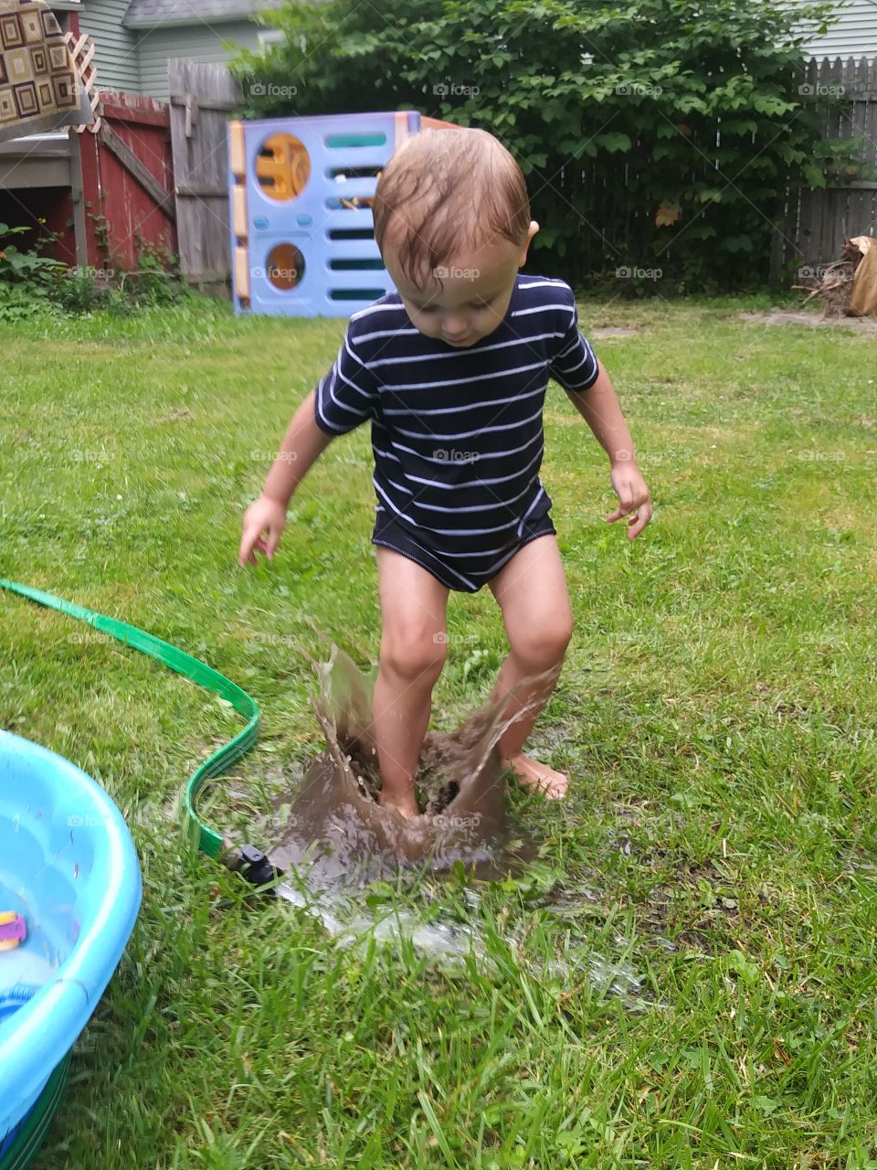 baby boy splashing