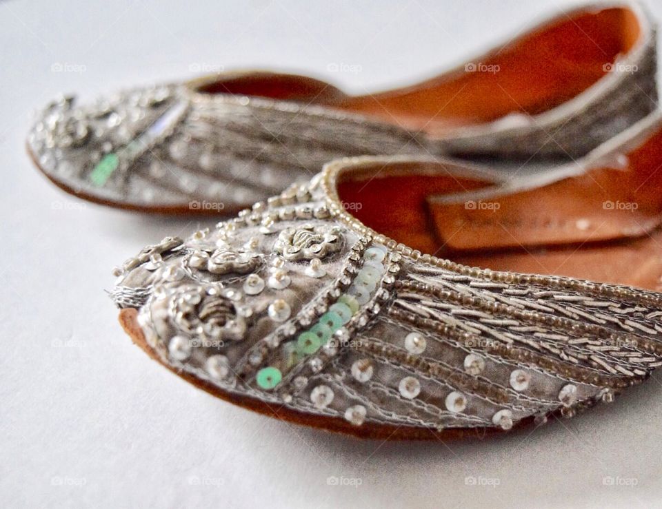 Close-up of traditional women shoes