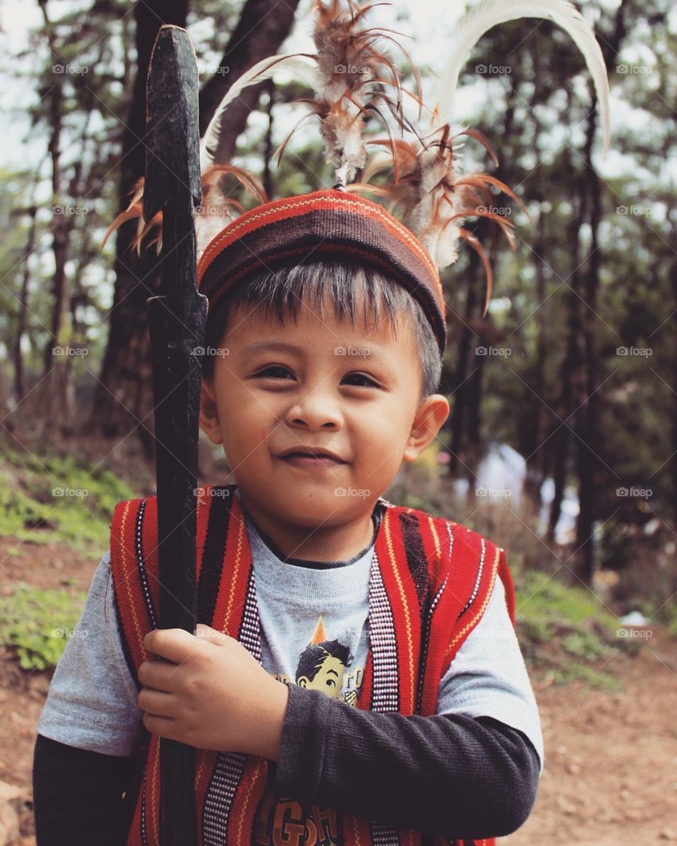 Little asian boy from the mountain province of Benguet Philippines wearing his native clothing.