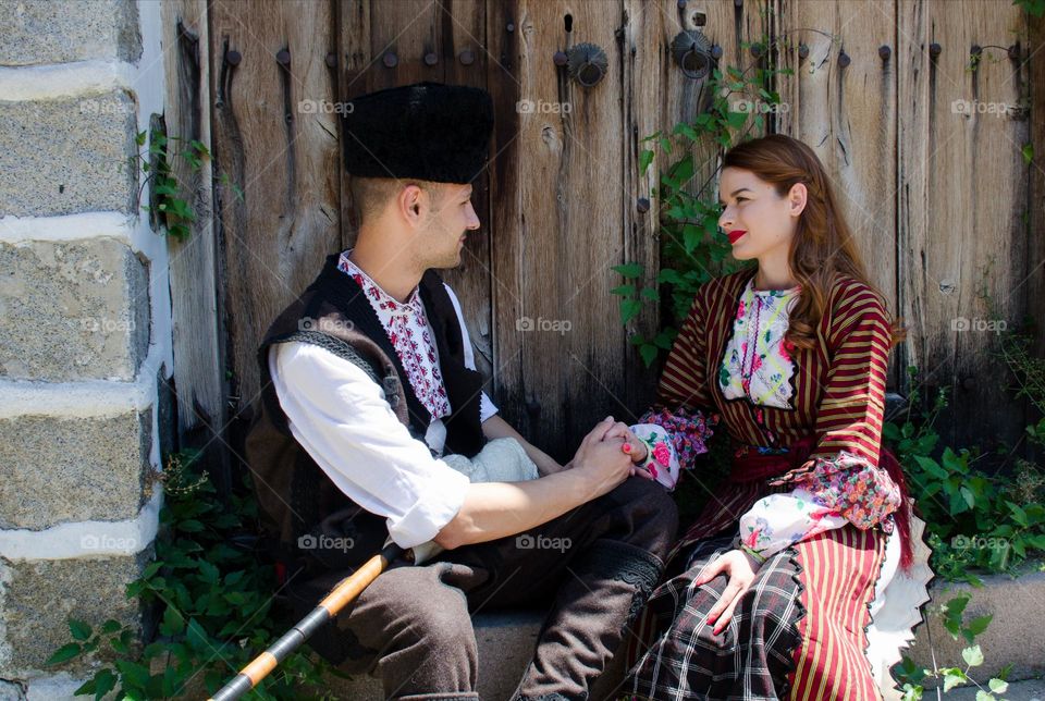 Tenderness Series:Beautiful Happy Couple Young Husband Wife, Dressed in Bulgarian Traditional Clothing (nosiya)