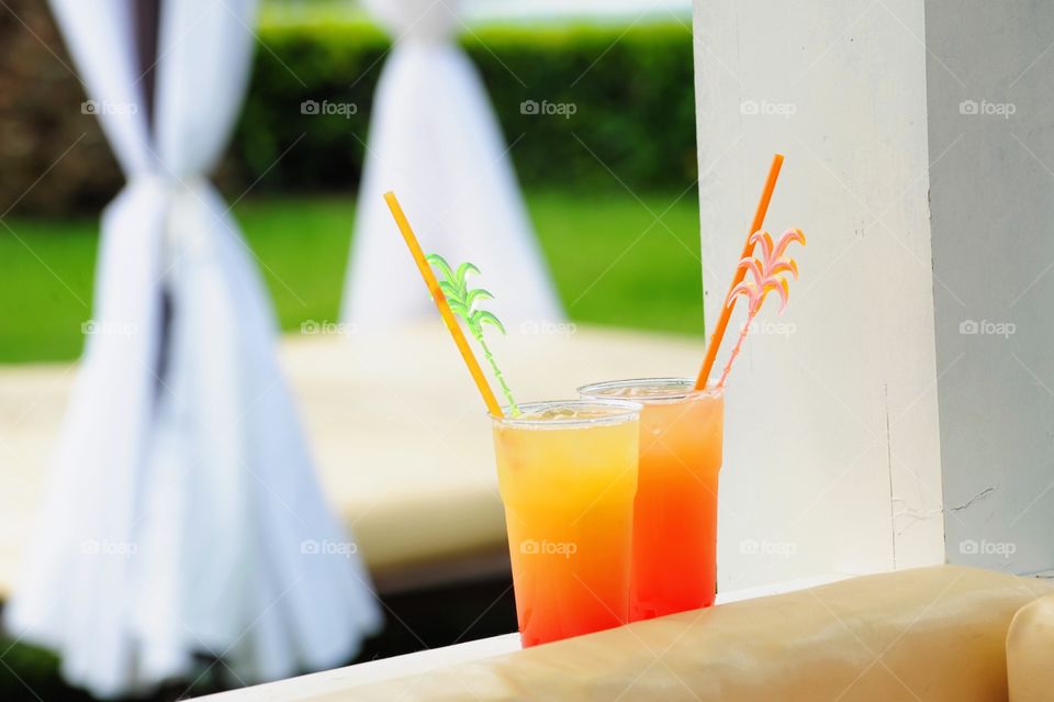 Two cocktail glasses outdoors