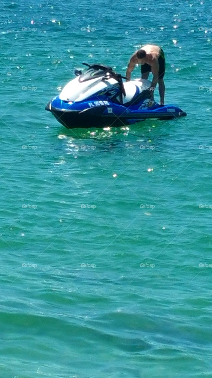 Hot guy having problems with his jet ski..South Beach Miami Fl