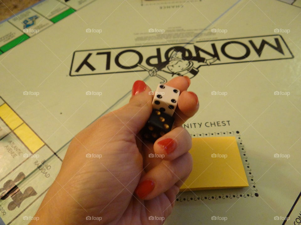 Roll of the Dice. Board game, in mid roll. 