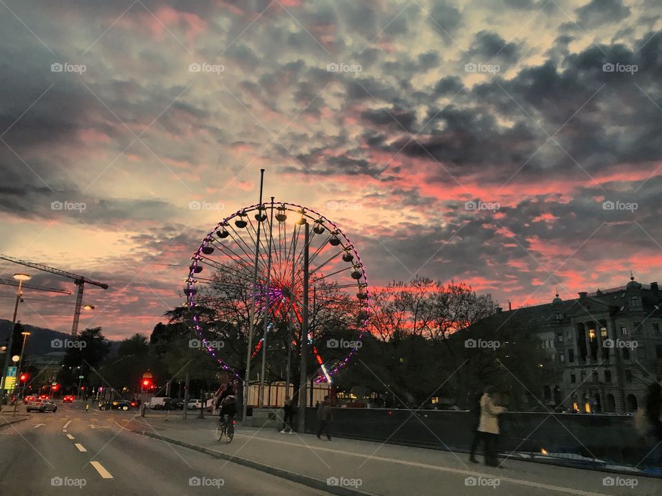 Ferris wheel in a moody sunset. 