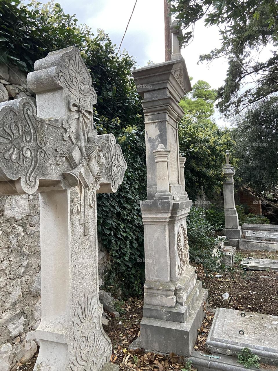 Crosses and tombstones in an old cemetery.