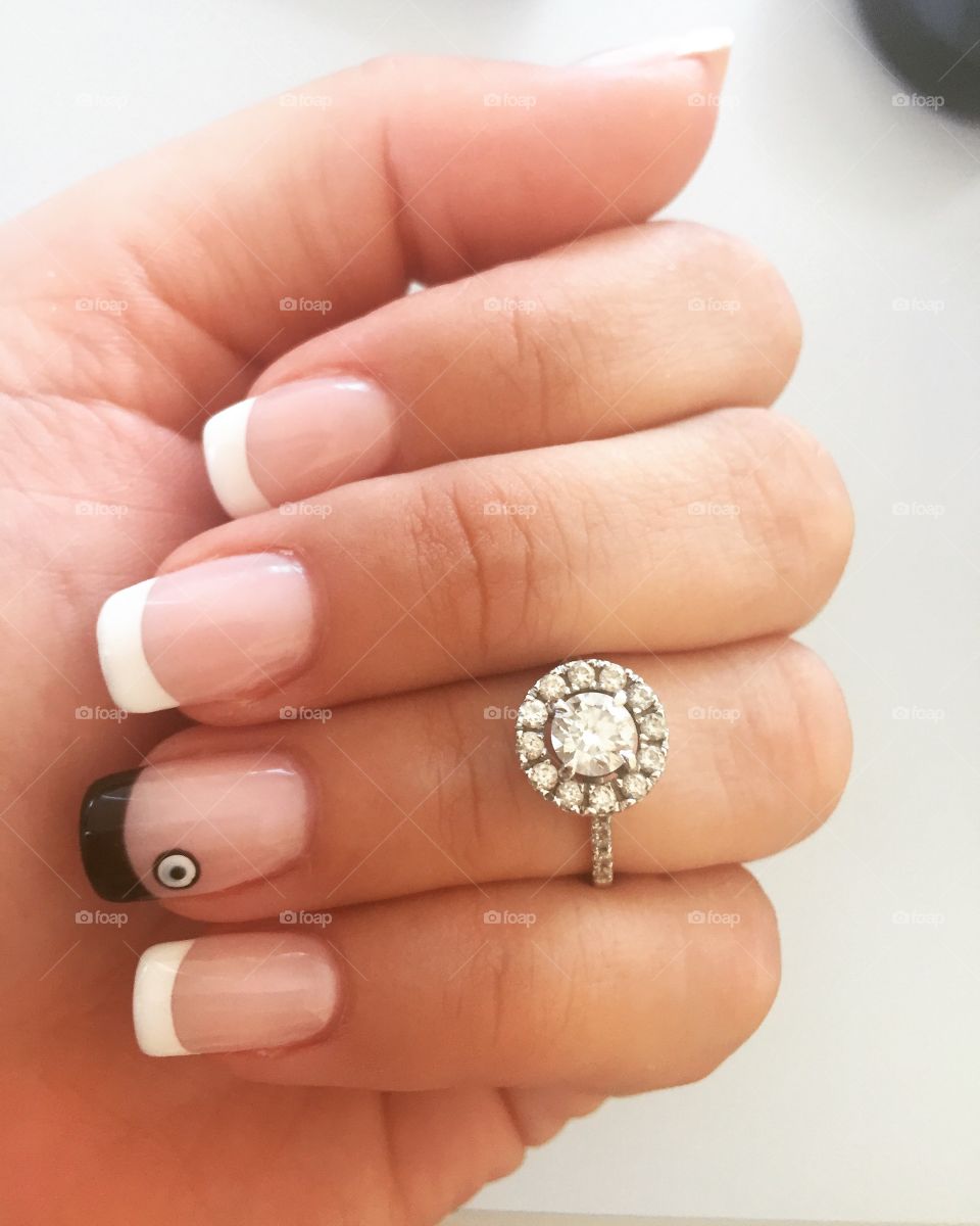 French manicure with bad eye art