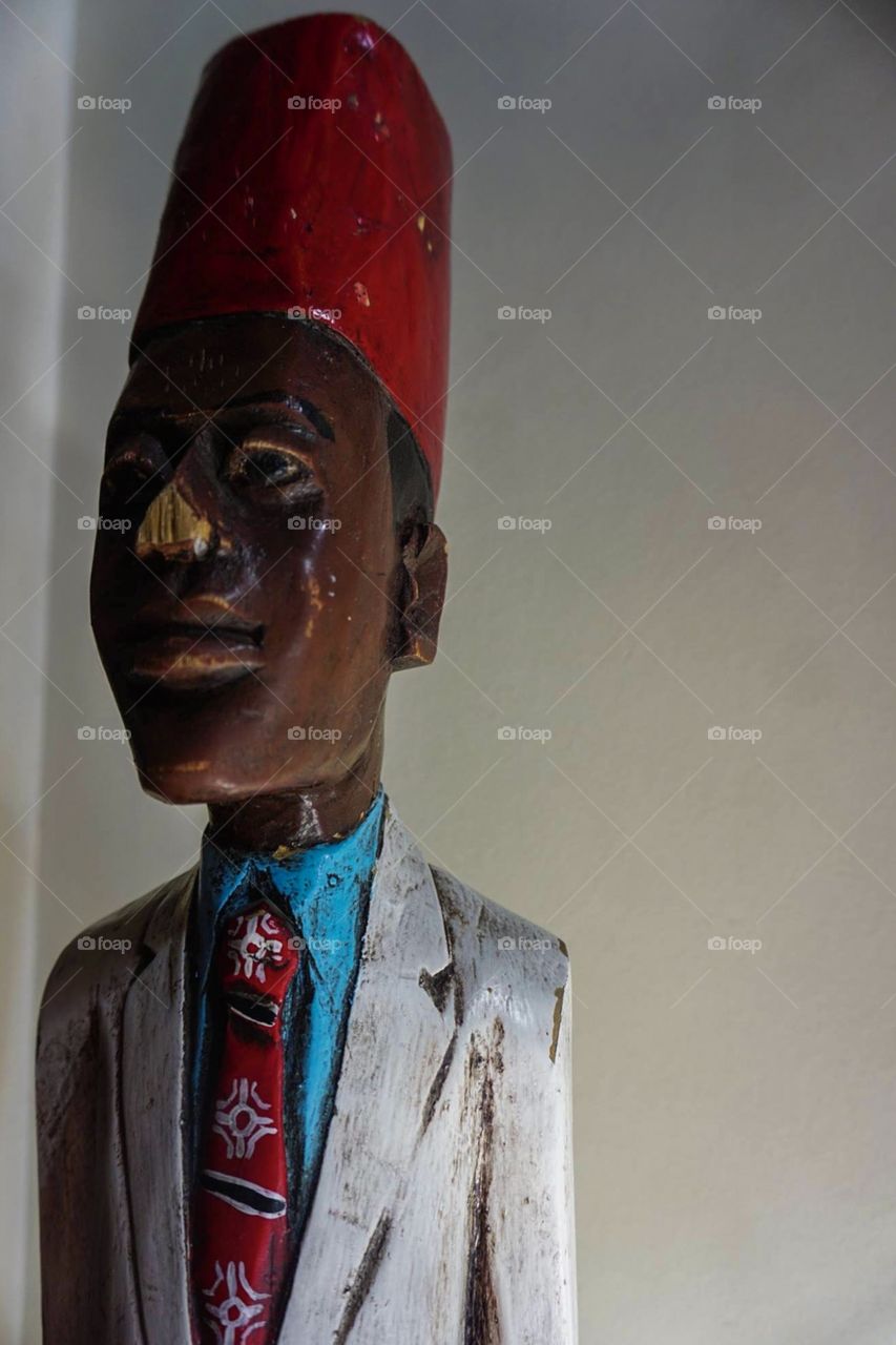 Wooden statue of African man