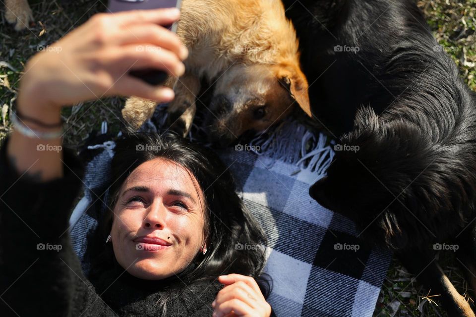 walking the dog, people walking the dogs on the street, they spend time together, the person plays with the dog, trains it, eat delicious food, take pictures. best friends are dogs. children and dogs for a walk