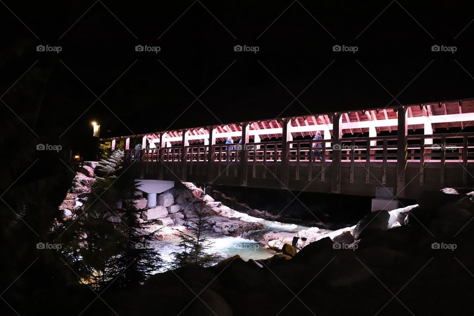 Bridge over the river enlightened at night 