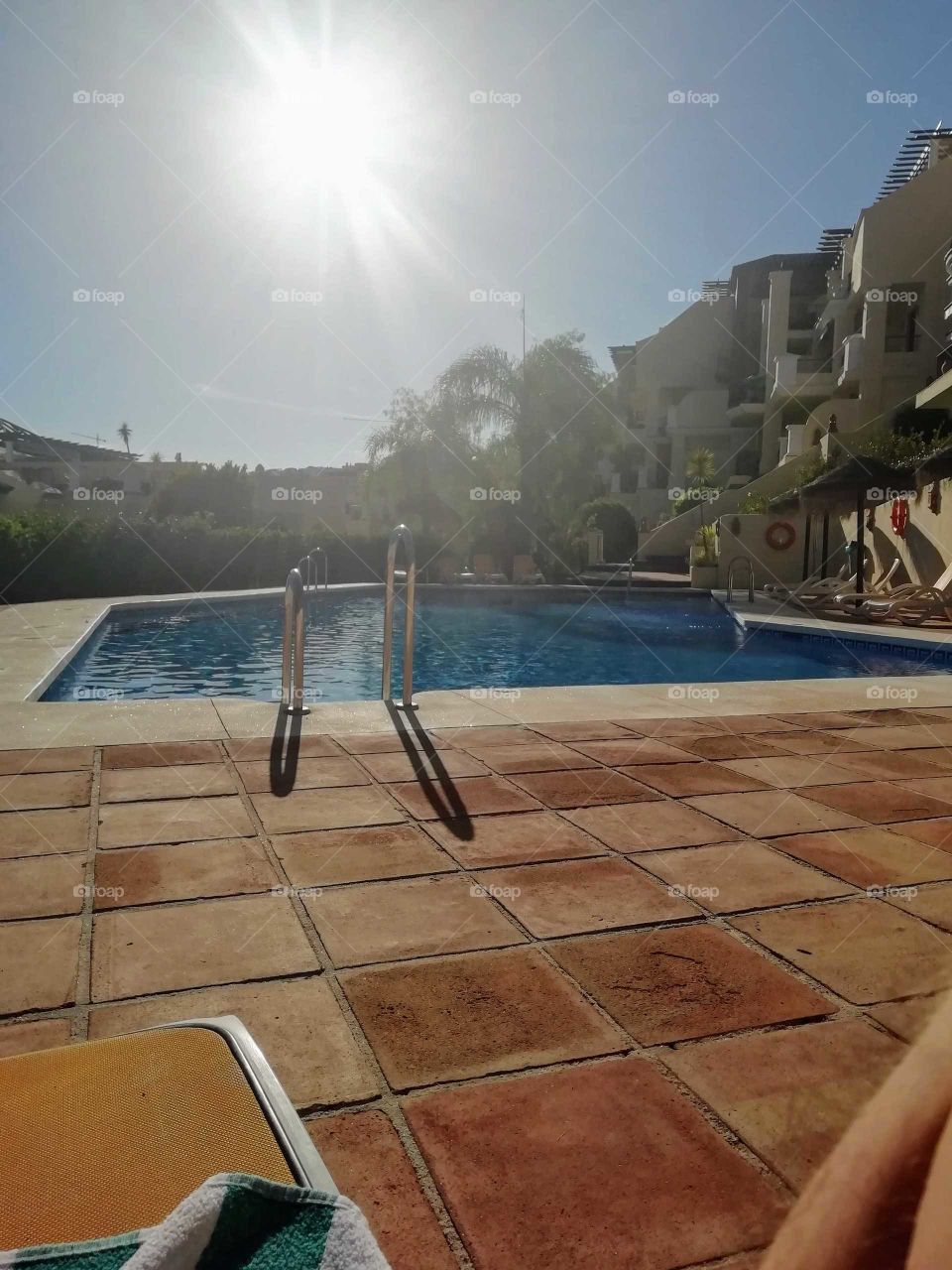 Swimming pool in the summer sun