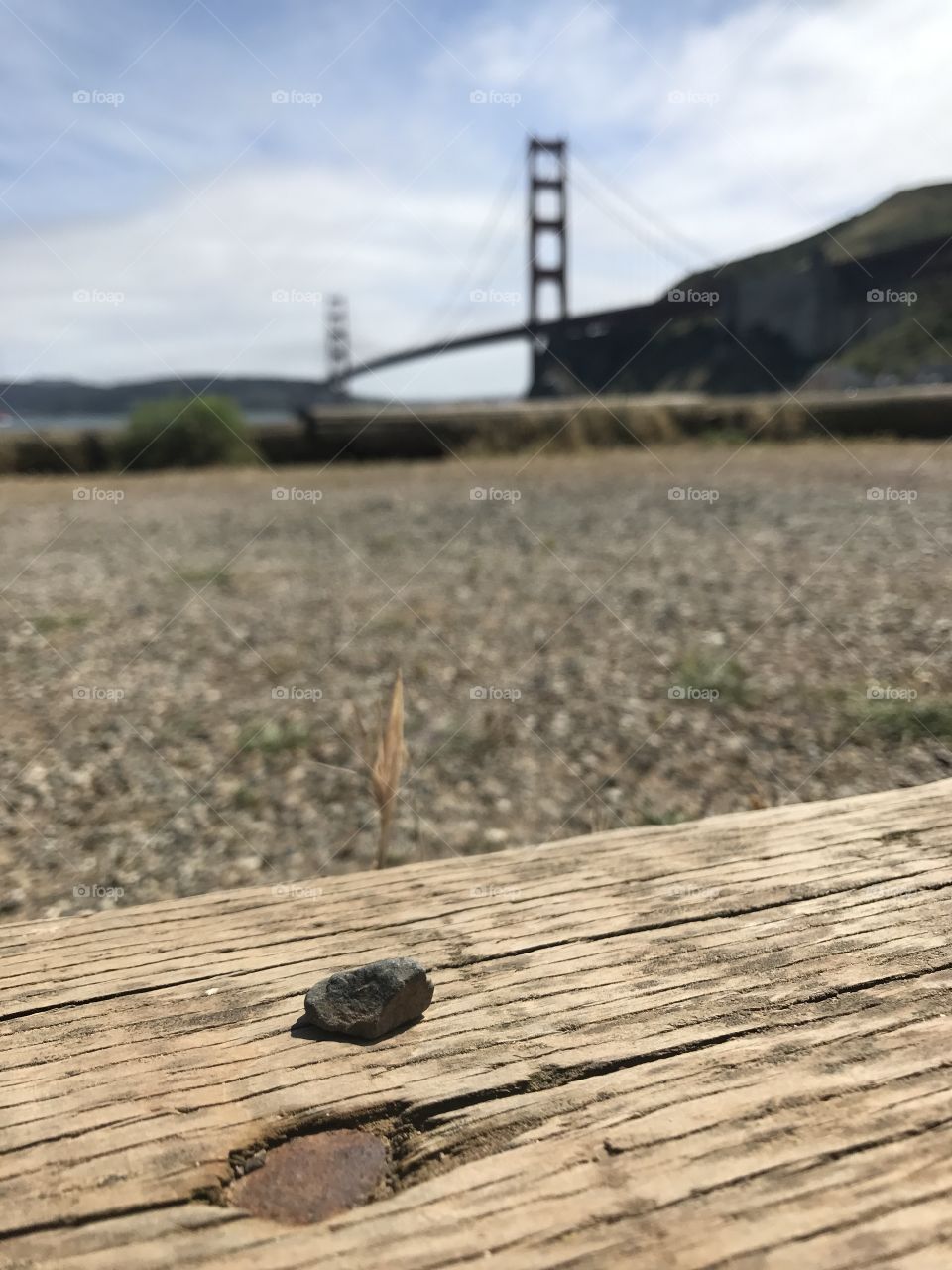 Vintage wood plank with the Golden Gate Bridge in the background 