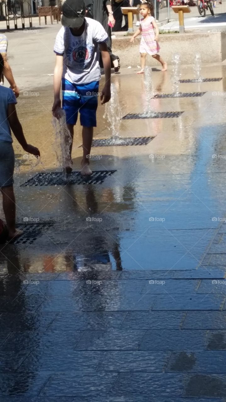 my son with the water