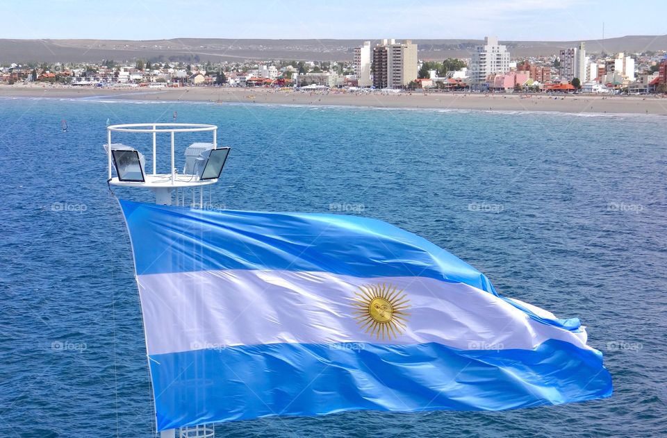 Argentine Flag over Puerto Madryn, Argentina 🇦🇷 