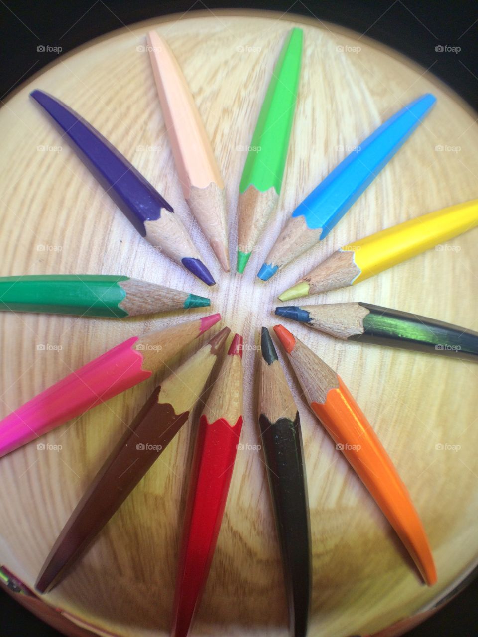 Pencils on a Desk. Pencils arranged in a circle shape ...