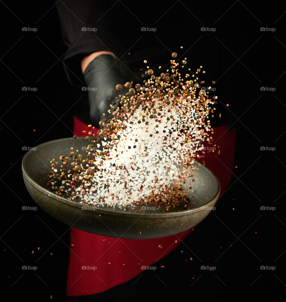 Salt and pepper in frying pan 