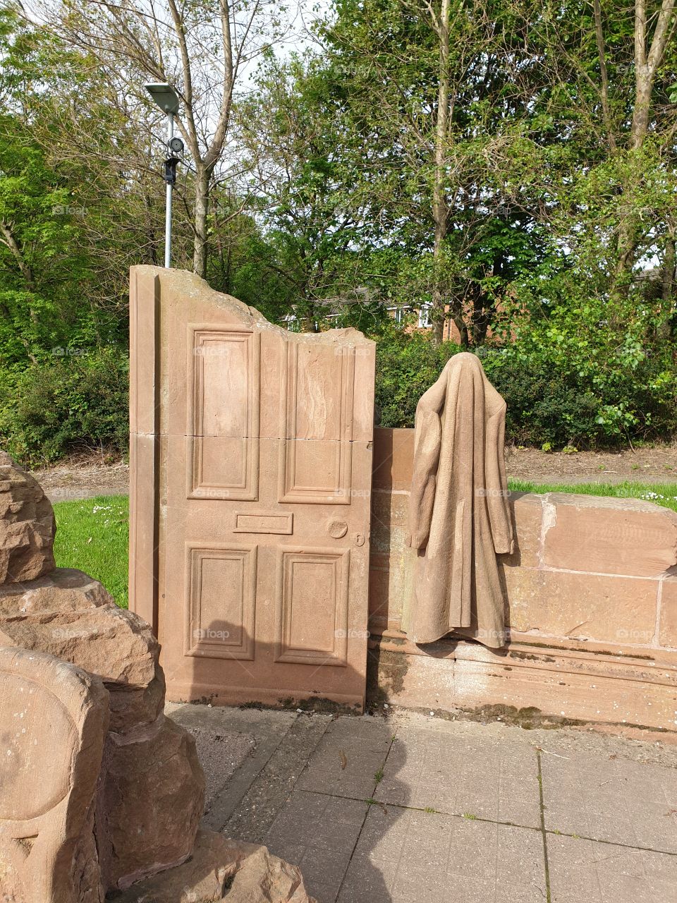 stone door and coat