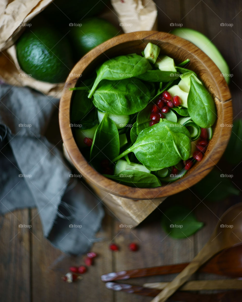 Salad in wooden bowl