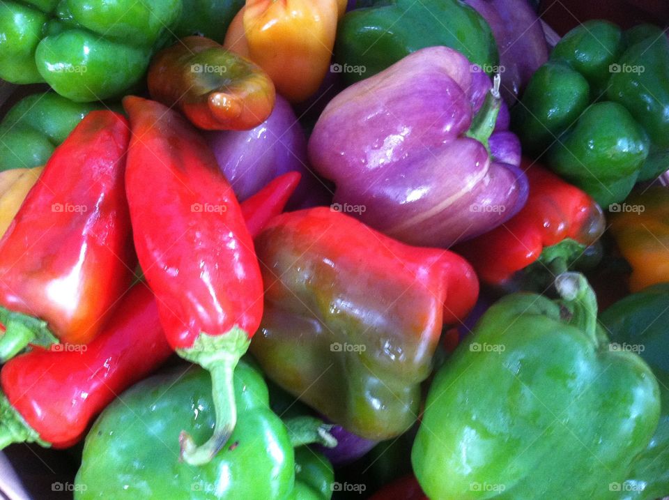 Peppers at the farmers' market. . Peppers are photographed while waiting to be purchased at a farmers' market. 