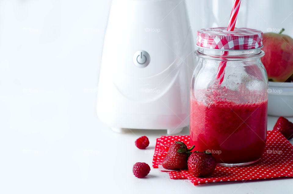 Delicious fruits smoothie in a jar