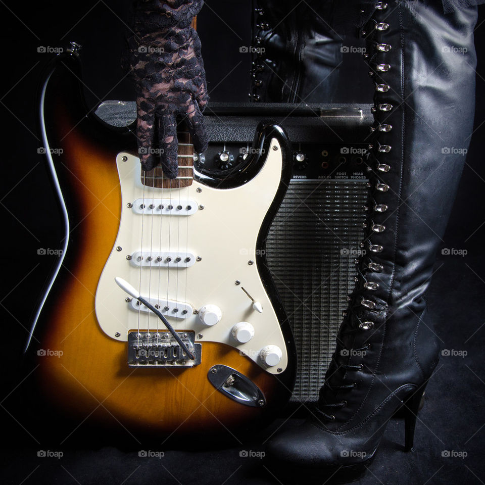 Woman With Guitar and Amp