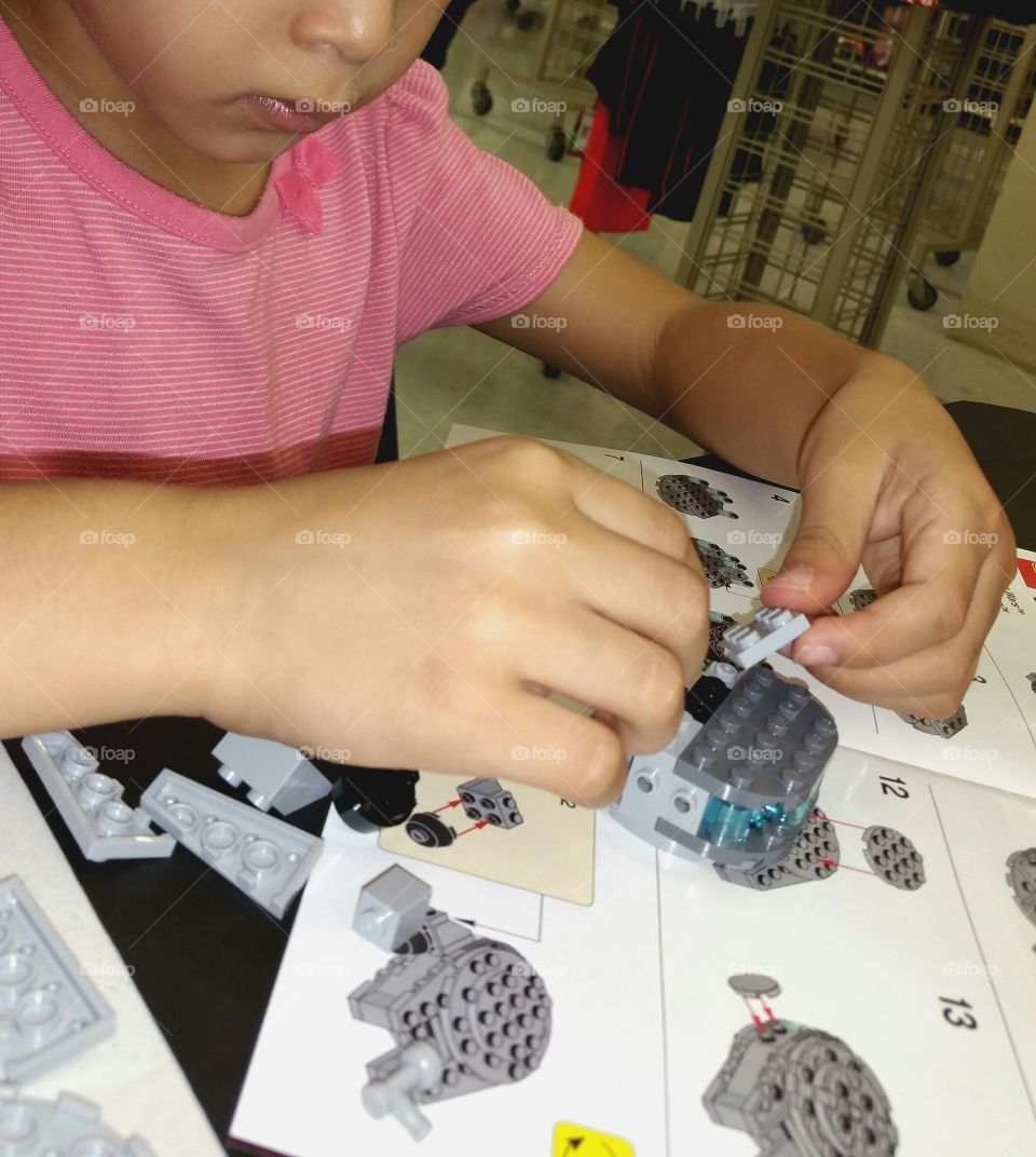 Girl building with blocks