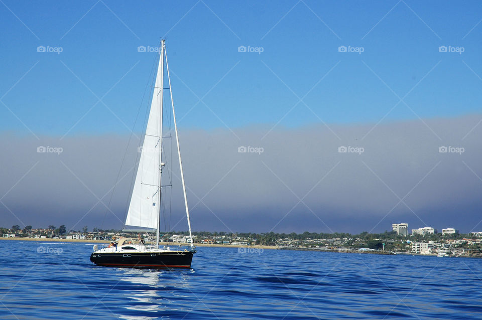 A sailboat in Newport Beach California. 