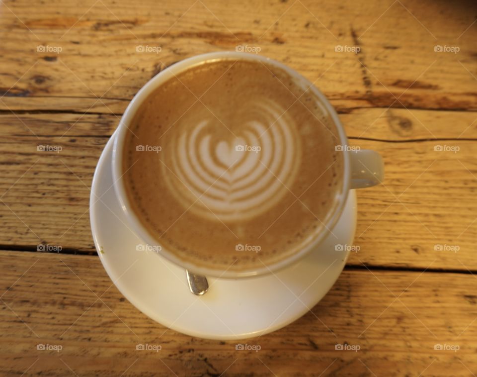 Coffee with a love heart pattern 