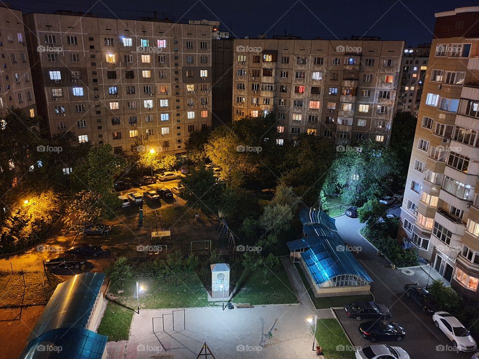 night home yard in dencely populated residential area