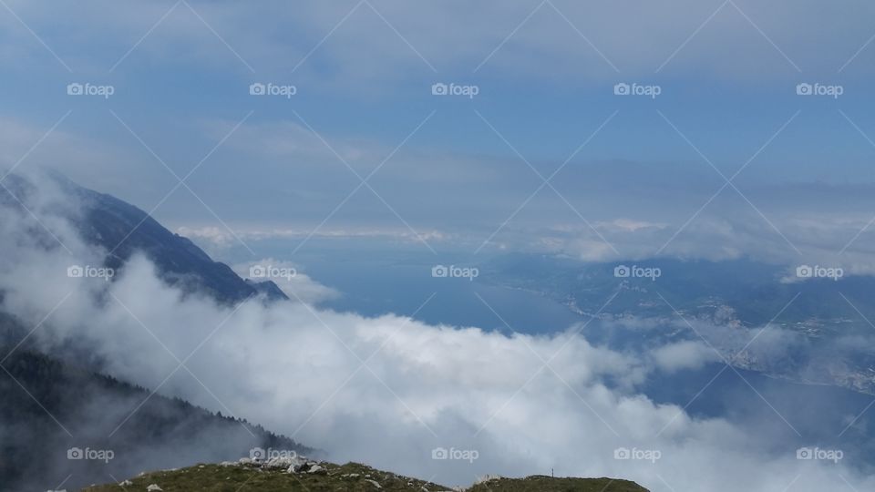 Clouds up a mountain in Lake Garda
