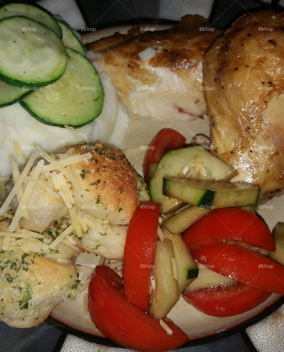 Homemade dinners are so yummy! Garlic knots, mashed potatoe, baked zuch ini, cucumber and tomatoe in balsamic vinegar, oven-roasted chicken to boot!