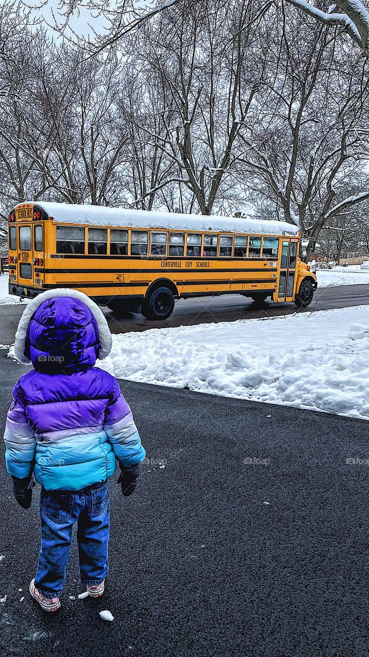 Rectangular shapes in every day life, rectangle windows on a school bus, small child watches bus go by from driveway, toddler wants to ride in school bus, toddler fascinated with school bus, toddler’s attention captured by school bus driving by