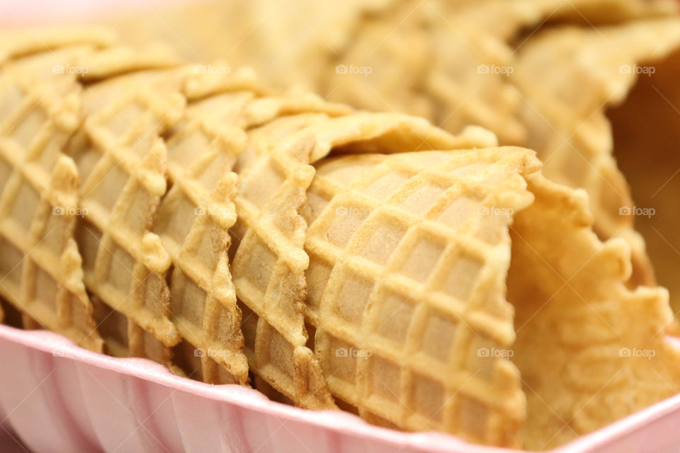 Freshly baked and stacked ice cream waffle cones 