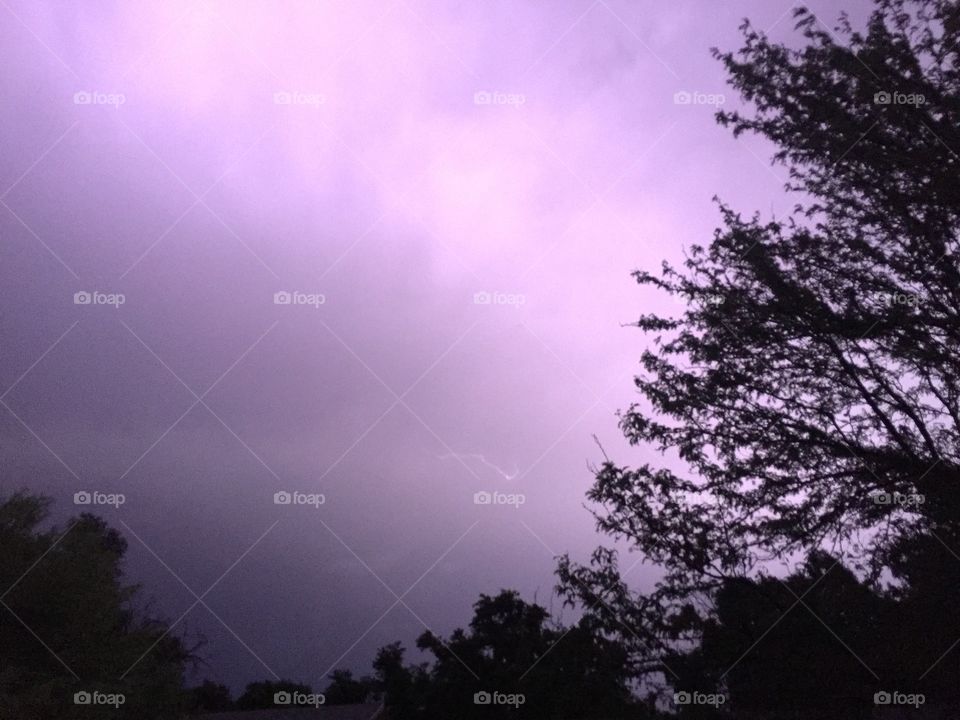 Lightning in purple storm sky