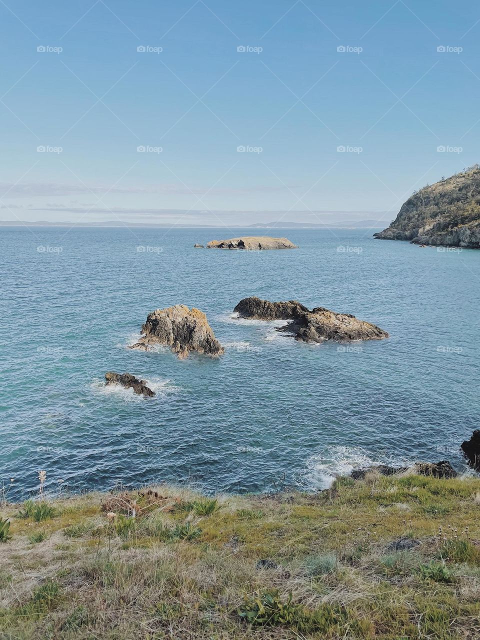 Sun day view of ocean from cliff