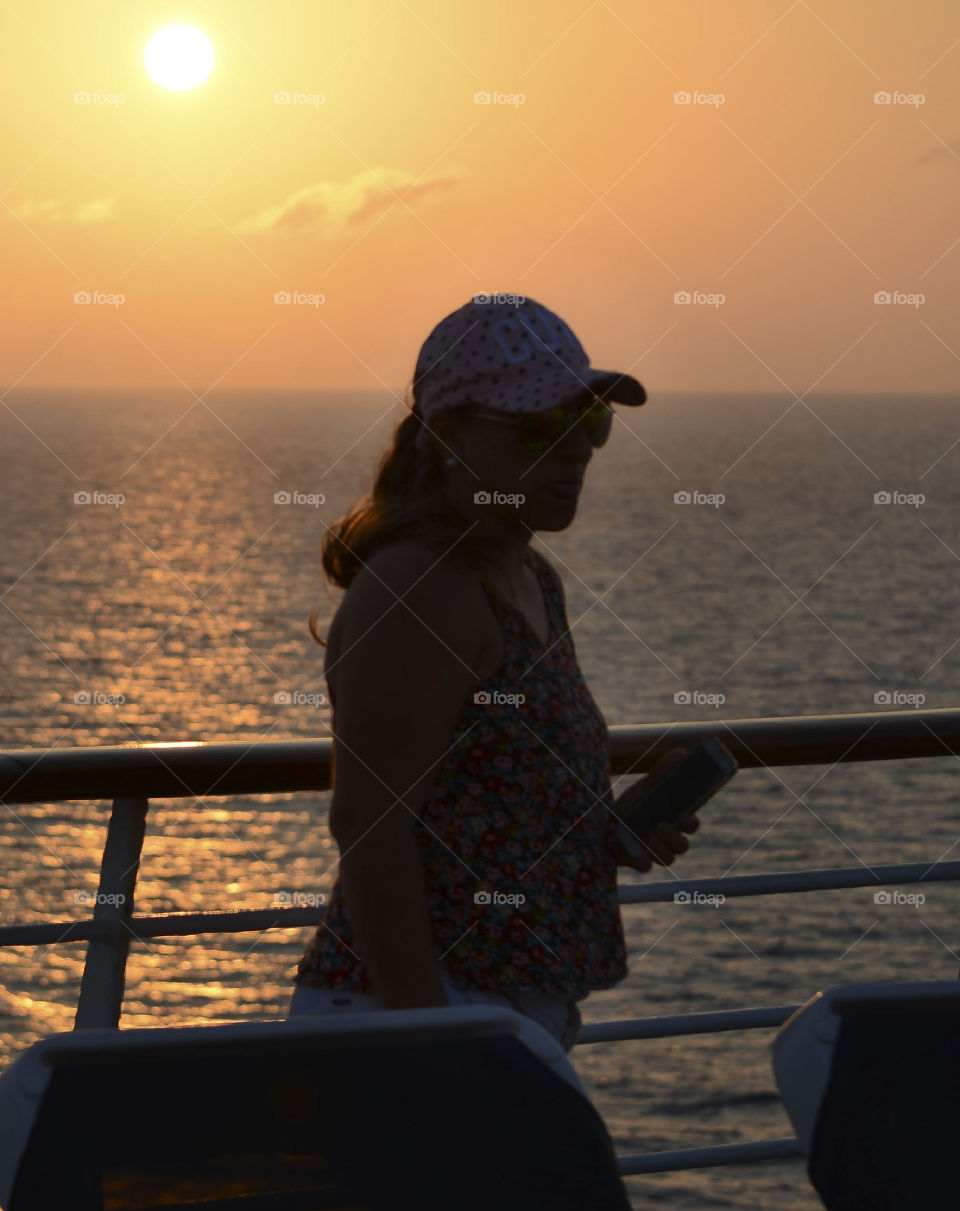 Woman standing near railing