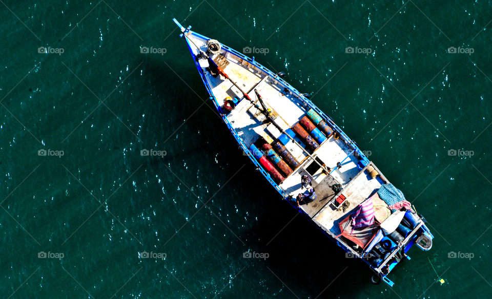 Directly overhead of a Somalian fishing boat while conducting anti piracy operations in the Indian Ocean off the coast of Somalia Africa