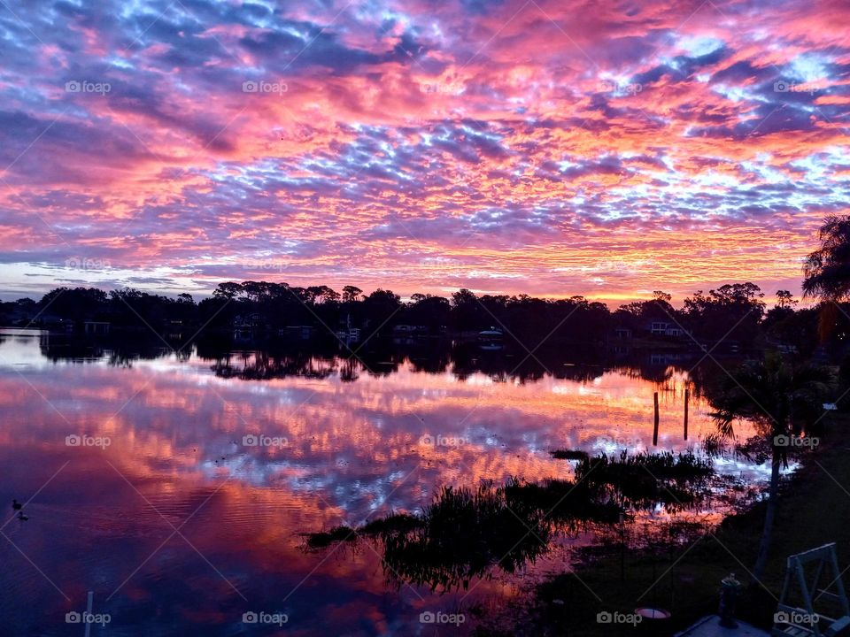 Colorful Sunrise Reflections off Lake