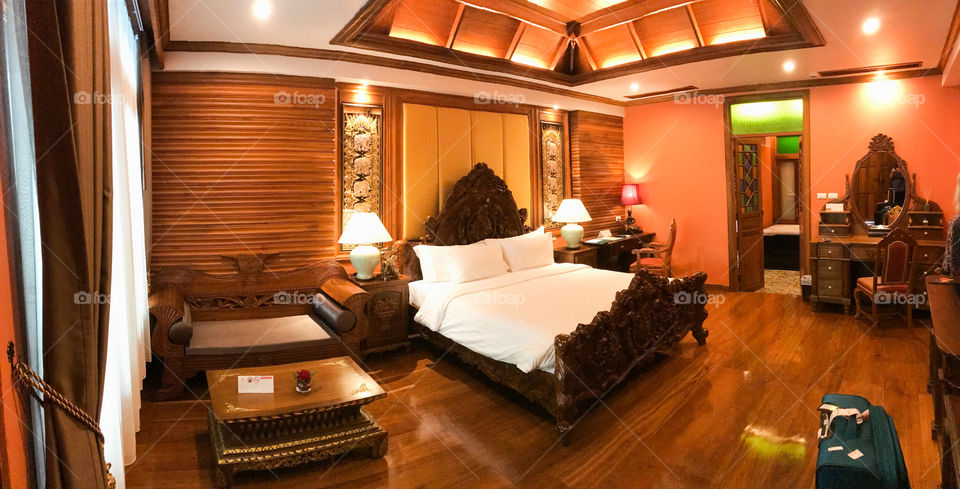 Beautiful suite furnished in traditional Thai style with stunning hand carved teak. Wood floors and coved ceiling.