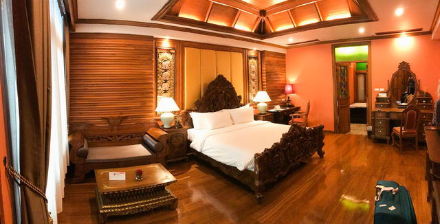 Beautiful suite furnished in traditional Thai style with stunning hand carved teak. Wood floors and coved ceiling.