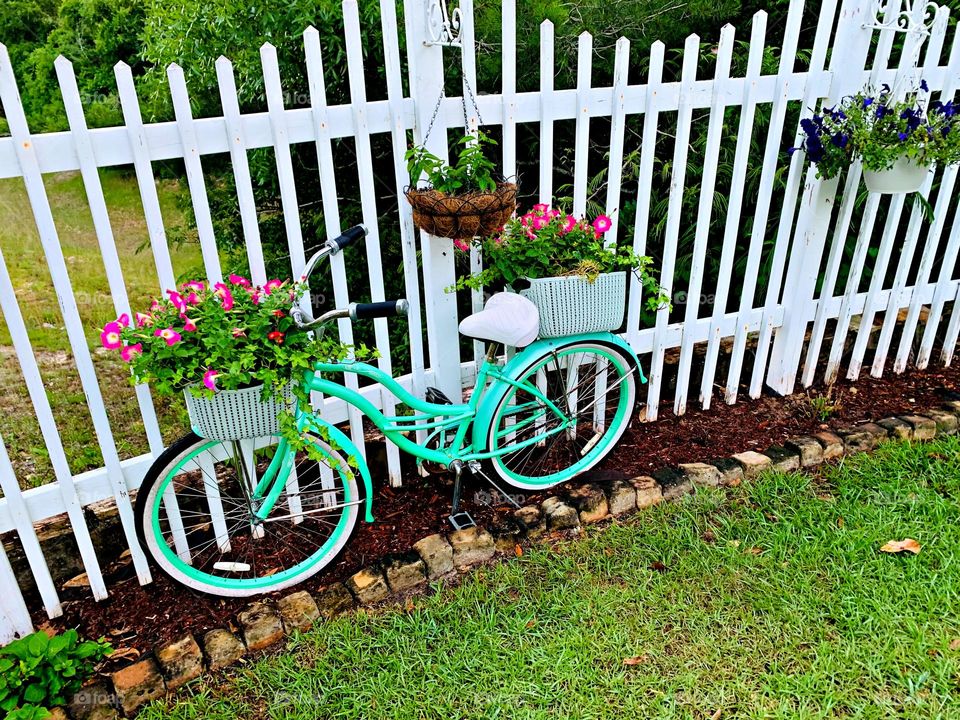 One Lonely Bicycle - There’s just something about a bike decorated with flowers that makes it look right at home. A certain nostalgia we associate with simpler times. 