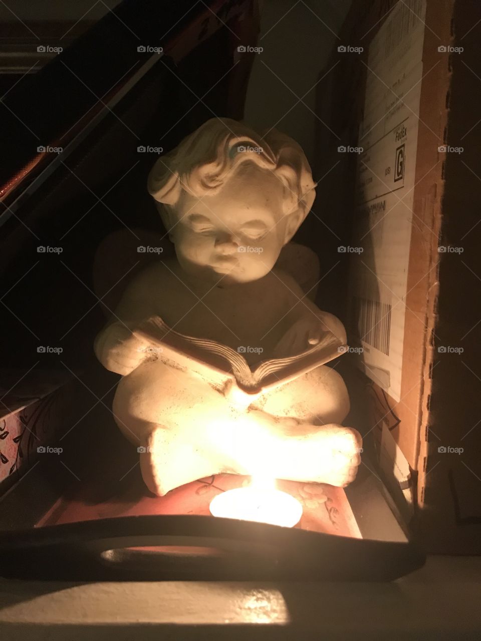 Angel statue with candlelight 