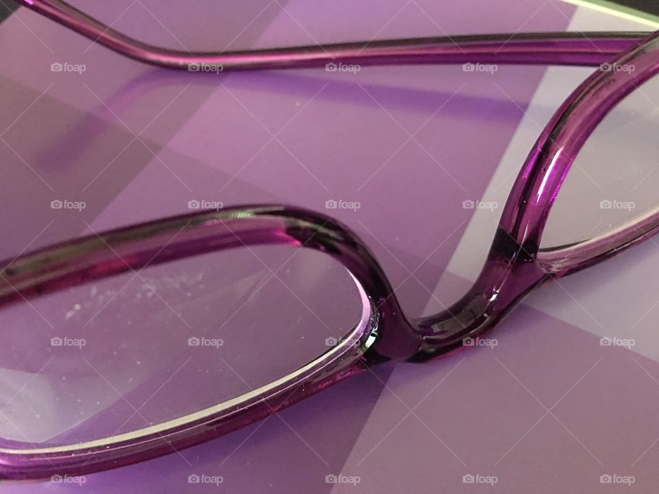 Close up glasses on color swatches 