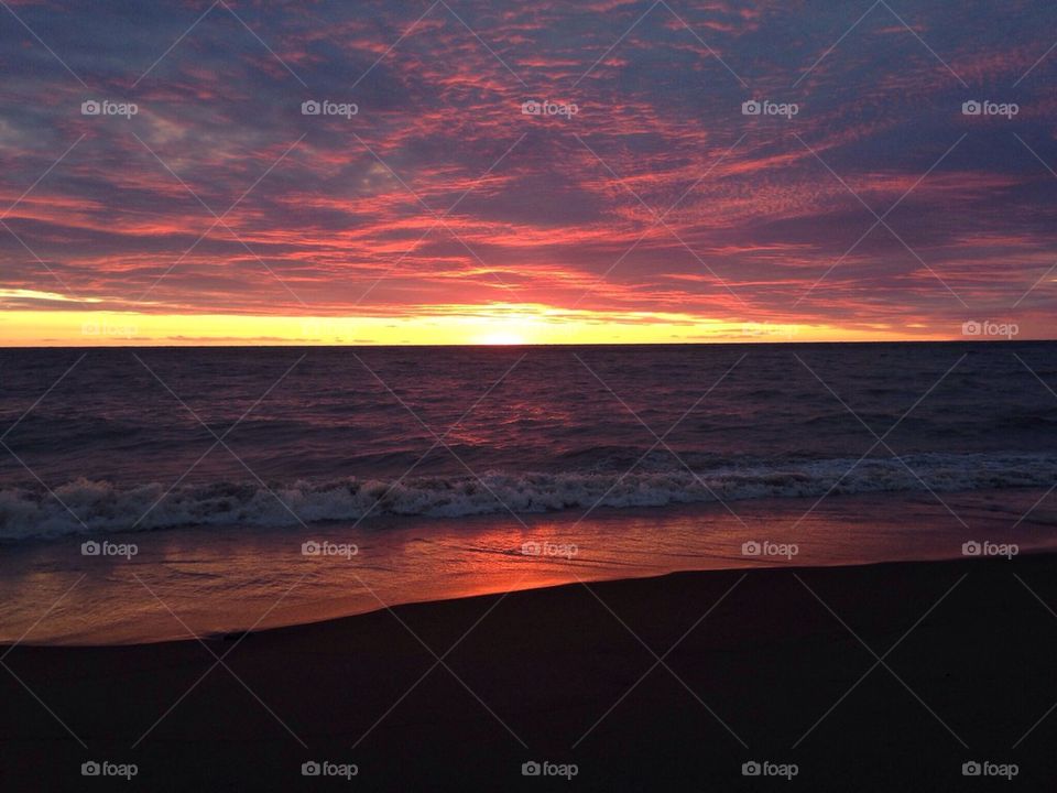 view of beach during sunset