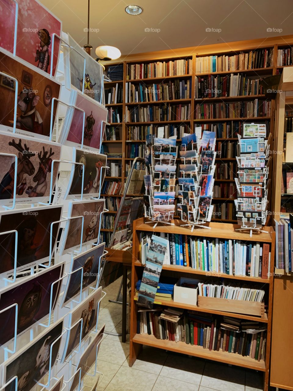 Local small and cozy bookshop. Here you can find old books, thousands of postcards, metal pins from all over the world and many other things 